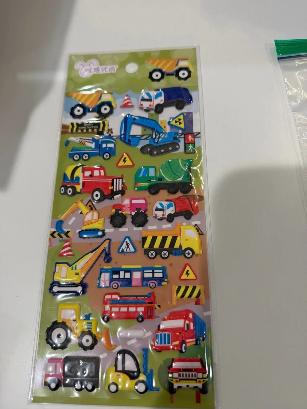 Bundle of back to school apple stickers, googly eyes, & transportation sticker